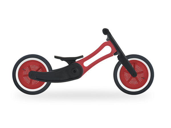 Red recycled balance bike