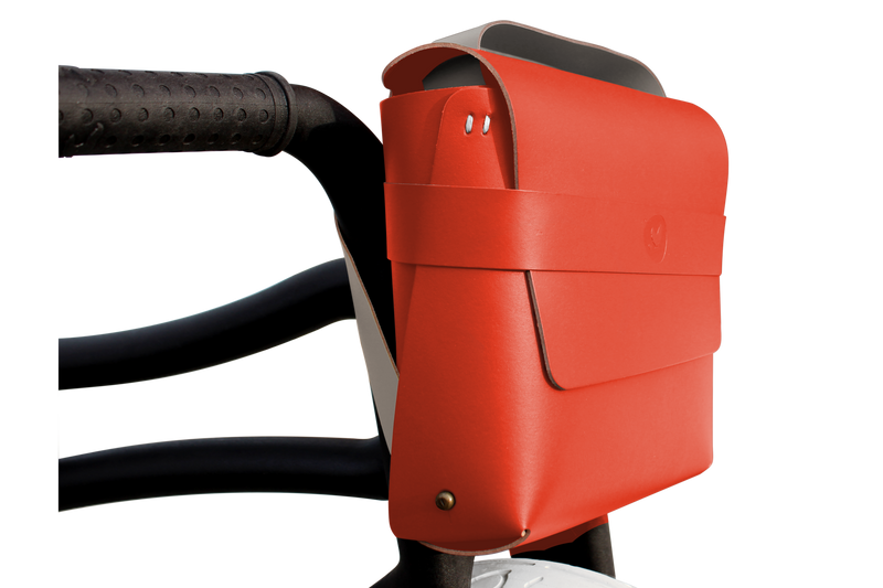 Red bike bag front mounted on recycled bike