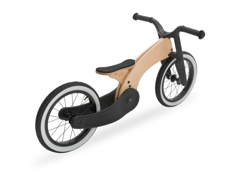 50's design balance bike wooden and recycled. White walls