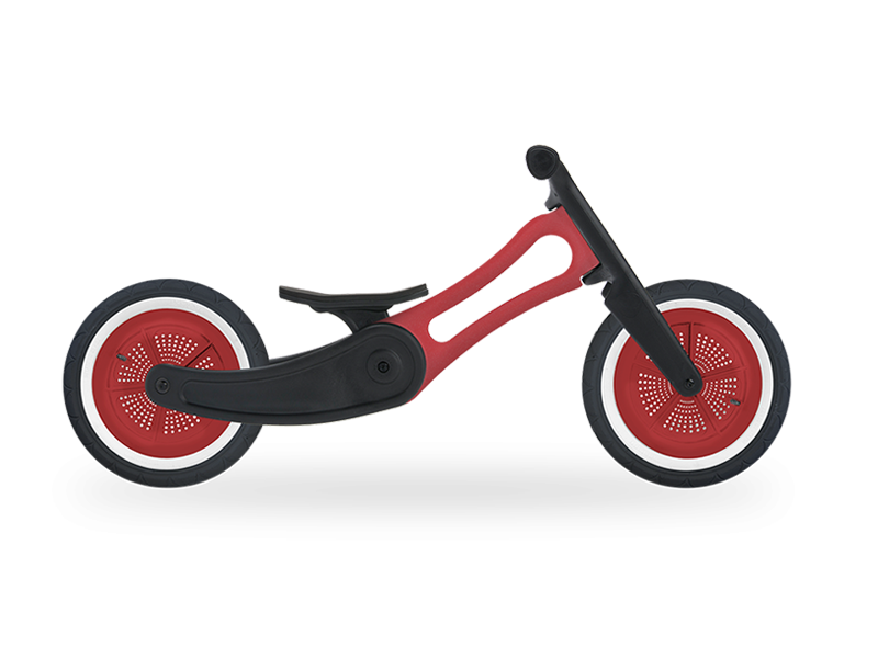 Red recycled balance bike